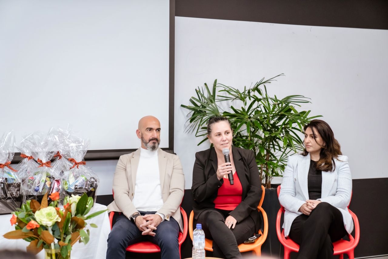Laura Cowell speaking on a panel discussion