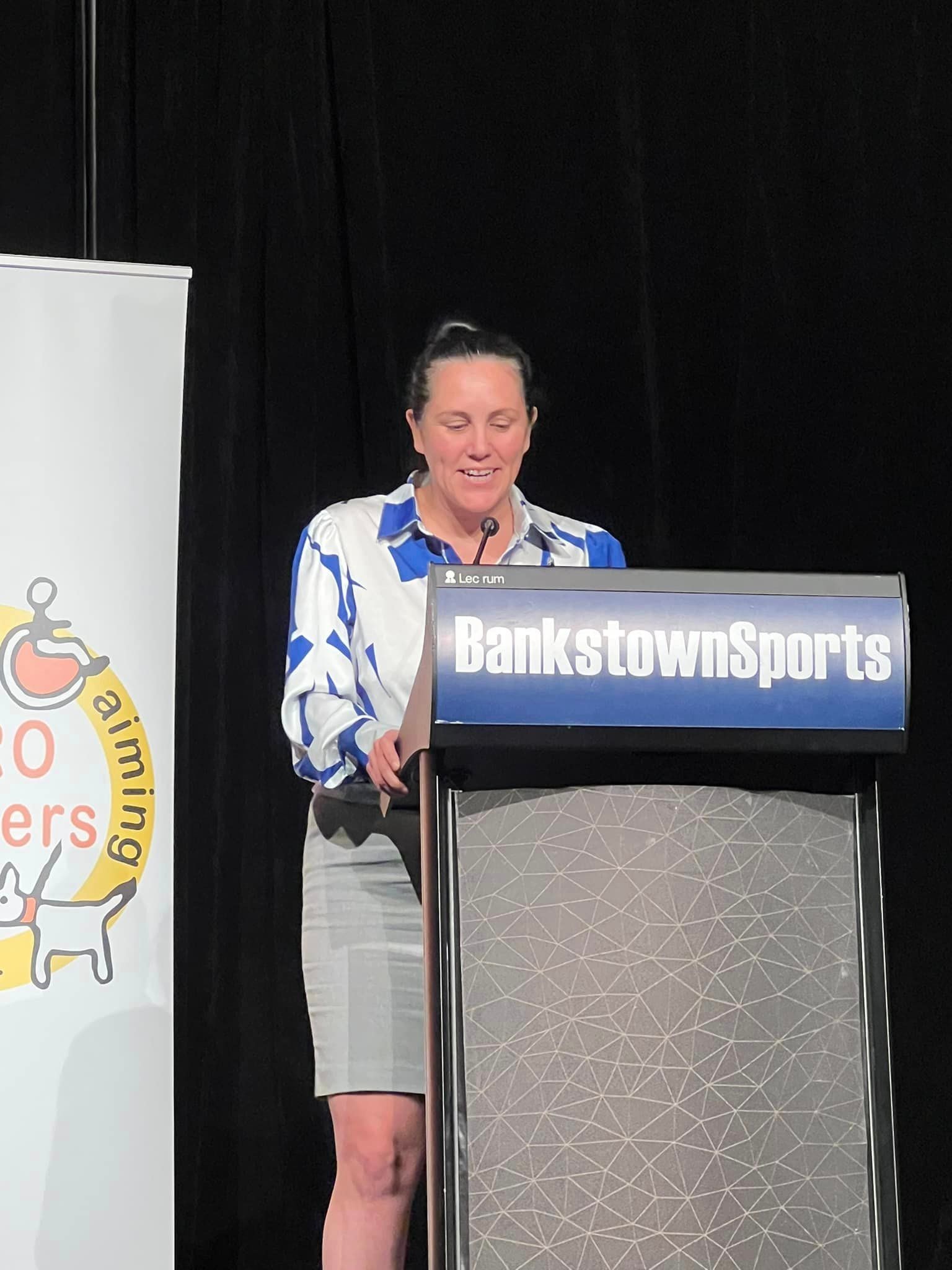 Laura Cowell at the podium